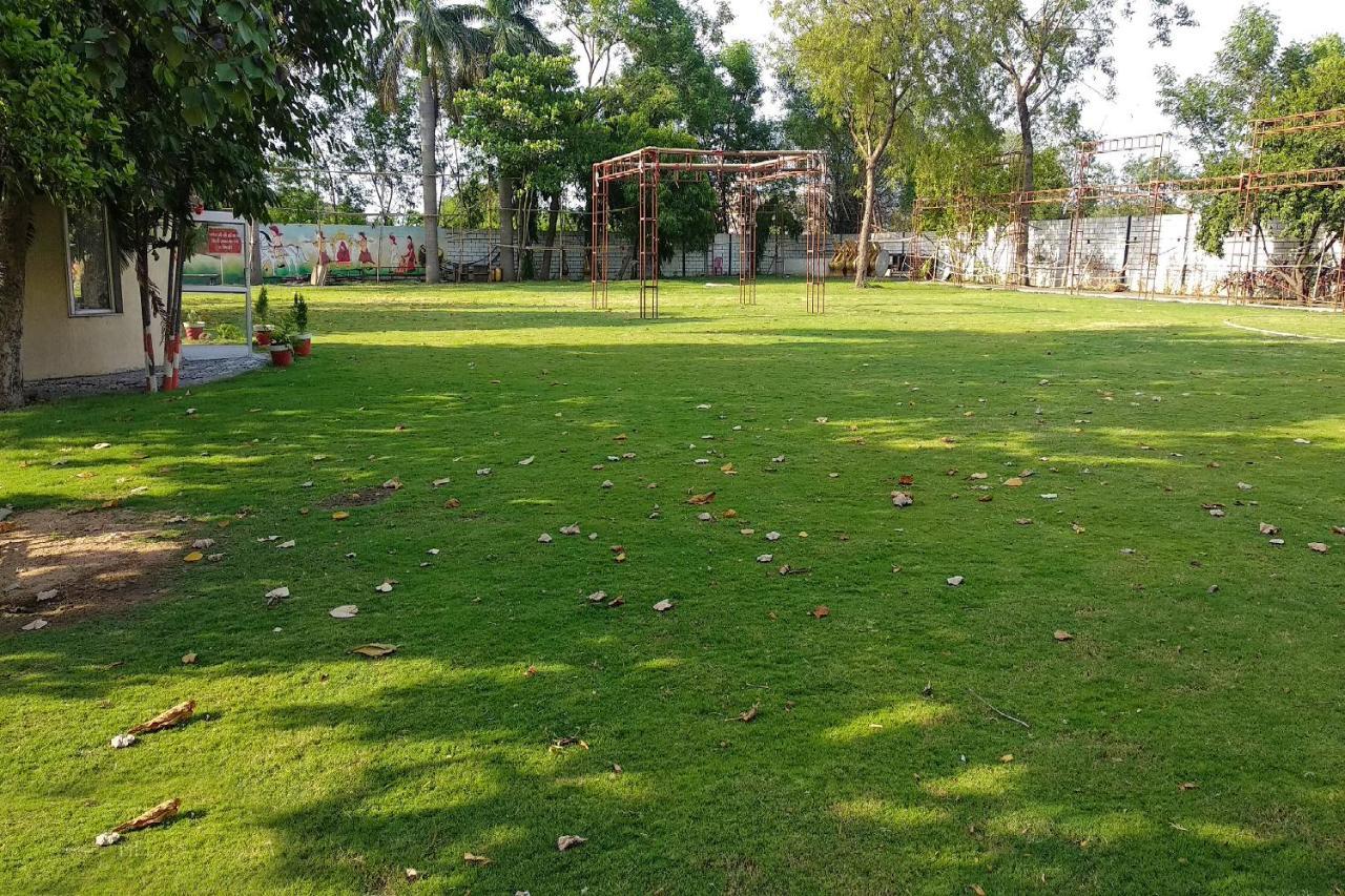 Oyo 14354 Amar Marriage Palace Hotell Dharmpura Exteriör bild
