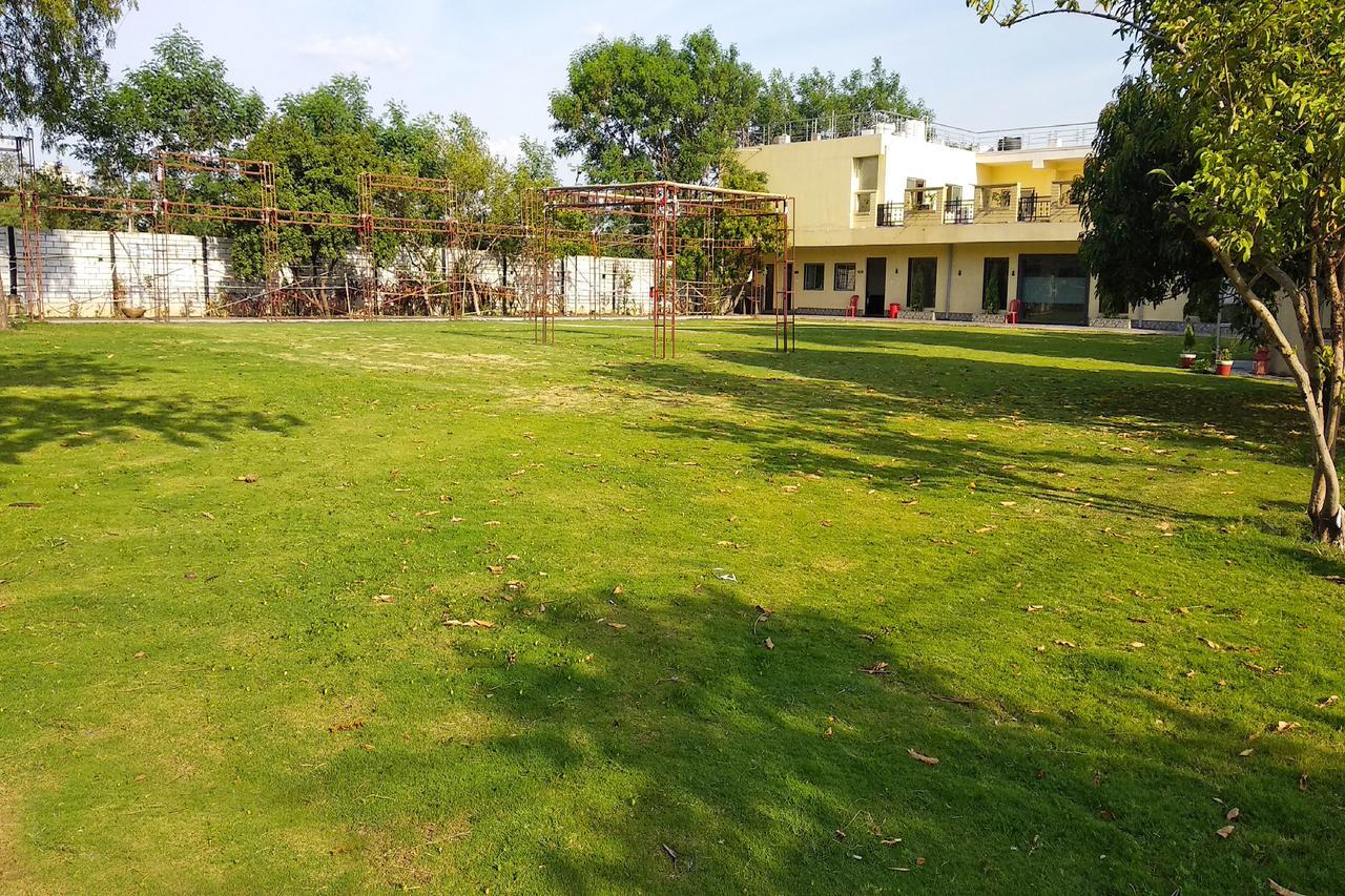 Oyo 14354 Amar Marriage Palace Hotell Dharmpura Exteriör bild